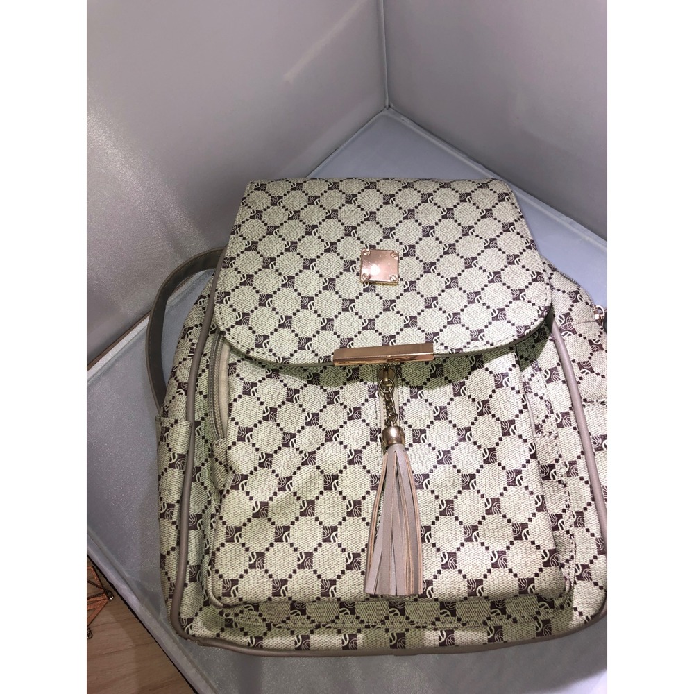 Monogram Print Tassel Backpack Tan Brown Geometric Pattern Gold Tone Hardware